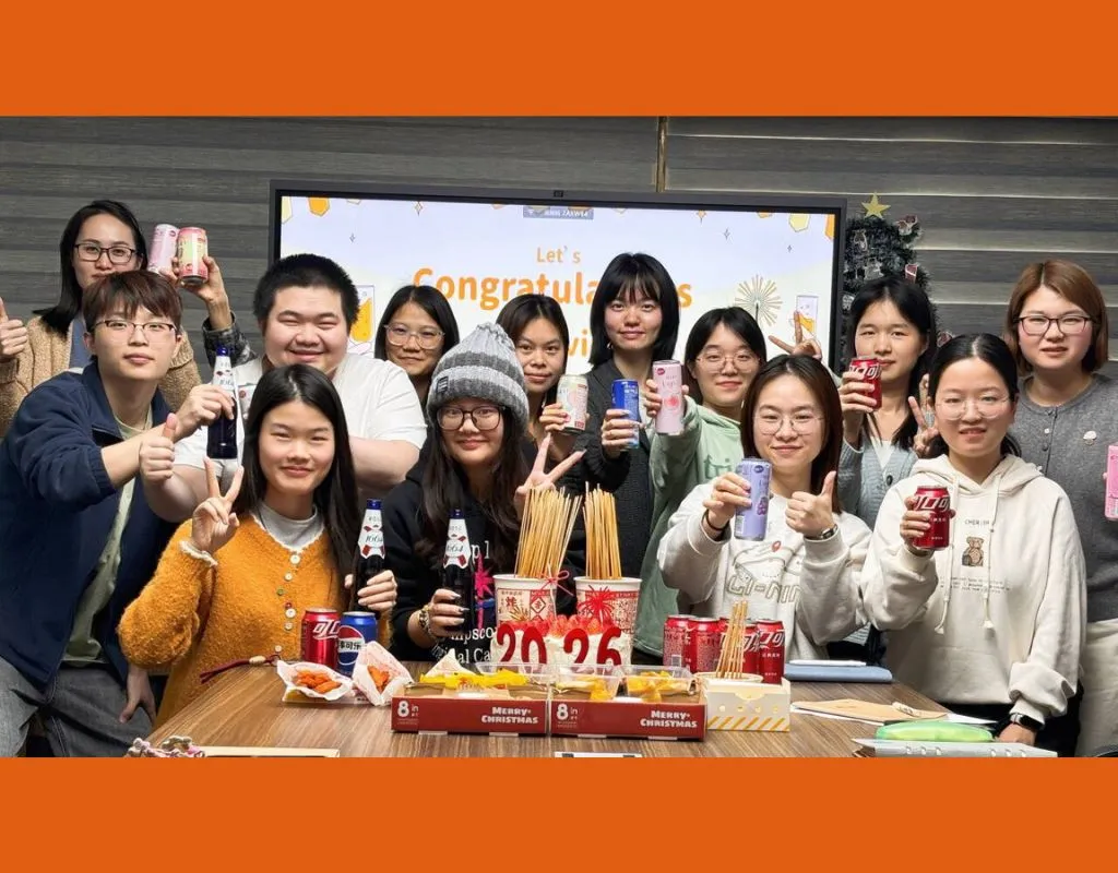 All members celebrate the achievement of annual goals